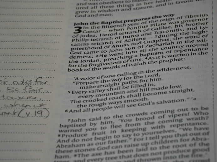 A close up of a book with writing on it